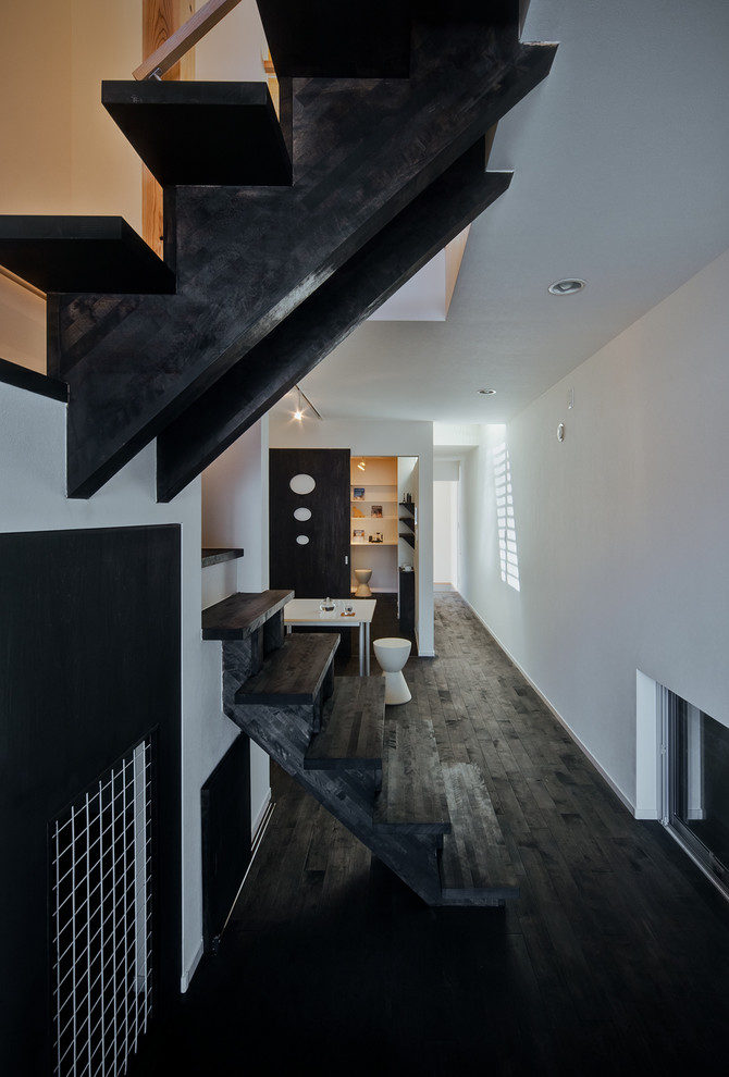 Inspiration for a contemporary wooden u-shaped open staircase remodel in Osaka