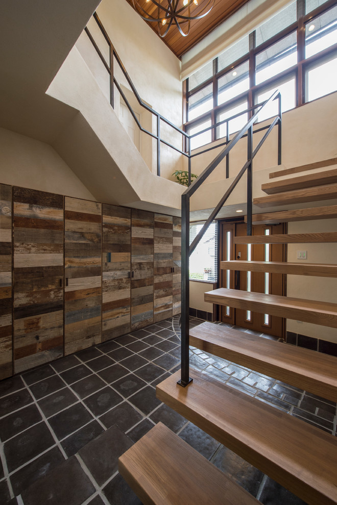 Inspiration for a rustic staircase remodel in Tokyo