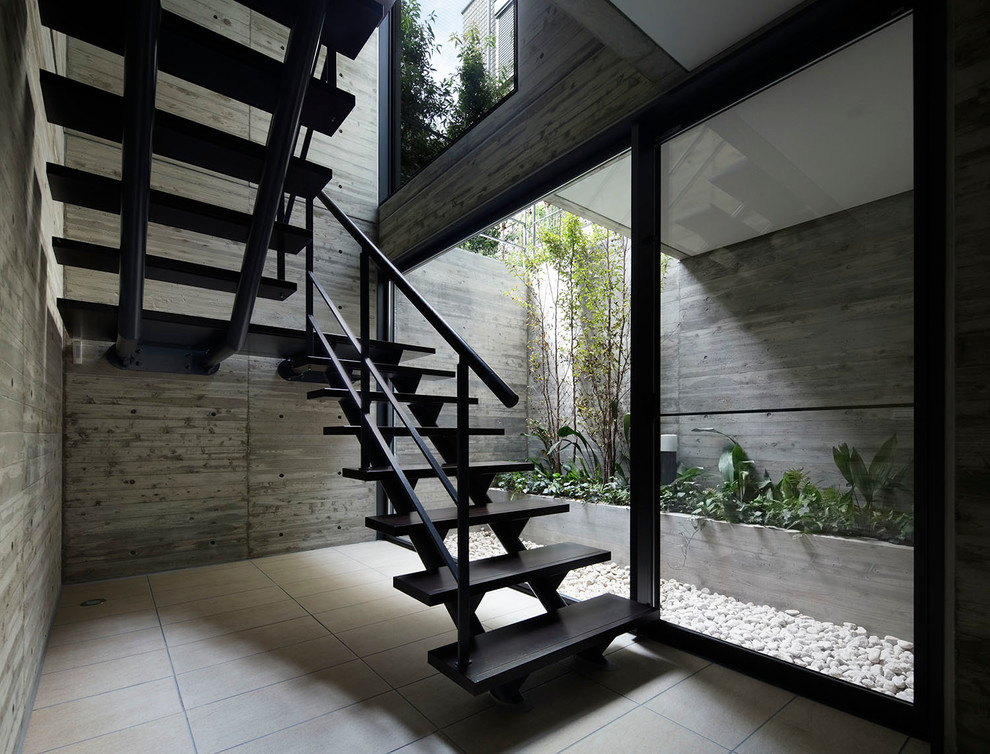 Свежая идея для дизайна: угловая лестница в стиле модернизм без подступенок - отличное фото интерьера